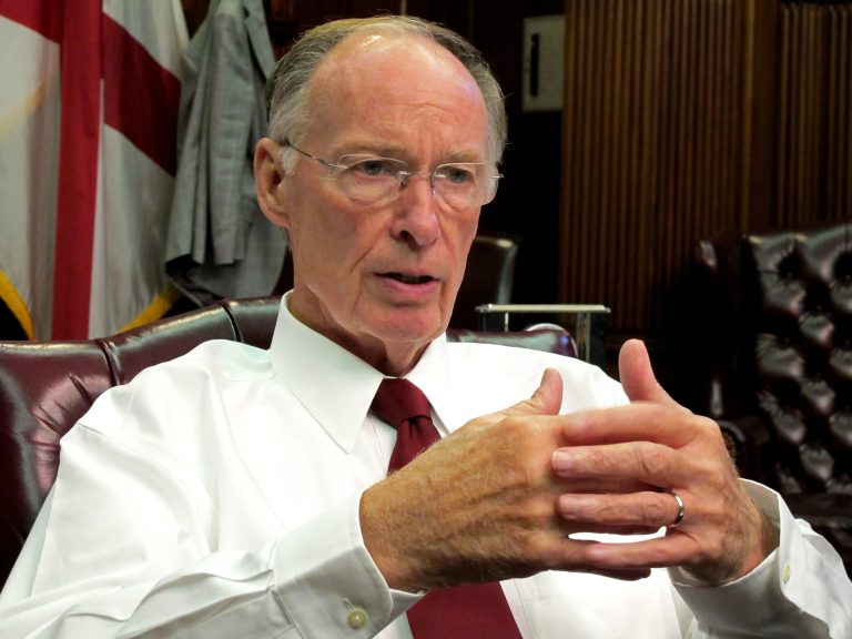 Alabama Gov. Robert Bentley talks about his upcoming trip to the Farnborough International Air Show during an interview Thursday, July 10, 2014, in his office at the state Capitol in Montgomery, Ala. (AP Photo/Phillip Rawls)