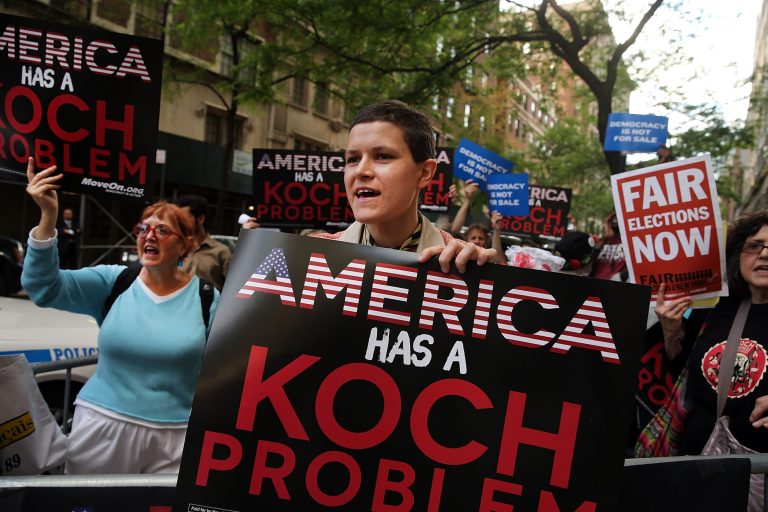 Activists hold a protest near the Manhattan apartment of billionaire and Republican financier David Koch on June 5, 2014 in New York City. (Photo by Spencer Platt/Getty images)