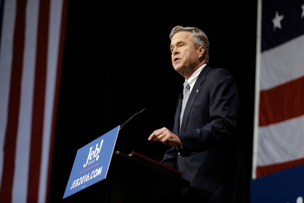 Bush attacks GOP rivals on defense spending