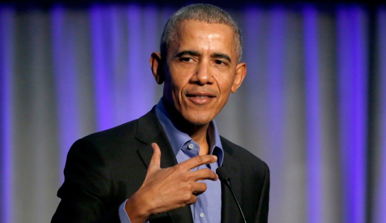 Former President Barack Obama on Tuesday addressed mayors from around the globe at a summit on climate change in Chicago. (AP Photo/Charles Rex Arbogast)