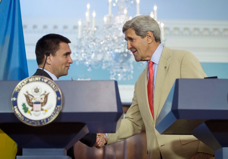 Secretary of State John Kerry, right, and Ukrainian Foreign Minister Pavlo Klimkin shake hands at the State Department in Washington,  Tuesday, July 29, 2014, during a news conference. The United States says there's been 