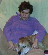 FILE -  This is an undated file image released on Wednesday Oct. 8, 2014 by animal rights organization PACMA, of Teresa Romero, the nursing assistant who is infected with Ebola in Madrid, with her dog named Excalibur.  Doctors say a second and conclusive test shows a Spanish nursing assistant infected with Ebola is completely clear of the virus. Jose Ramon Arribas of the Carlos III hospital said Tuesday the blood test showed Teresa Romero's immune system had eliminated the virus. Romero, 44, battled for her life after she tested positive Oct. 6 and was admitted to the Madrid hospital. (AP Photo / PACMA, File)