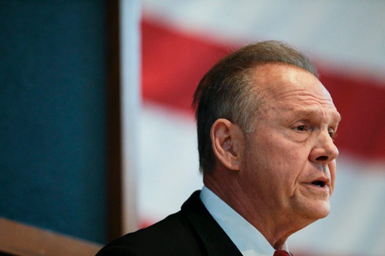 FILE - In this Thursday, Sept. 21, 2017, file photo, former Alabama Chief Justice and U.S. Senate candidate Roy Moore debates with Sen. Luther Strange in Montgomery, Ala. Strange and Moore face off Tuesday, Sept. 26 in the Republican runoff for U.S. Senate. (AP Photo/Brynn Anderson, File)