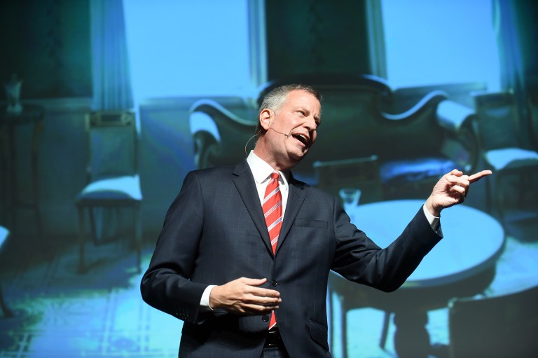 New York City Mayor Bill de Blasio said he felt a fleeting wave of compassion for Donald Trump when the Republican front-runner defended his home city in a debate. (David Handschuh/The Inner Circle Via AP)