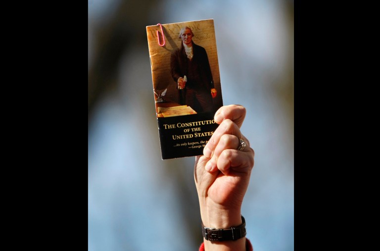 Students at Kellogg Community College located in Battle Creek, Mich., claim their constitutional rights were violated when they were arrested for refusing to stop handing out pocket Constitutions on school grounds in September 2016. (AP Photo/Gerald Herbert)