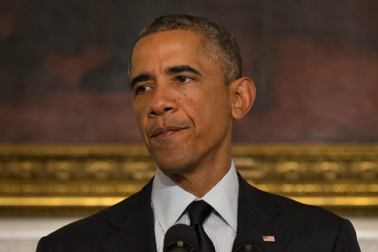 President Barack Obama pauses during a statement in the State Dining Room of the White House, on Thursday, Sept. 18, 2014, in Washington. Obama spoke after Congress voted to arm and train moderate Syrian rebels in the fight against the Islamic State group. (AP Photo/Evan Vucci)