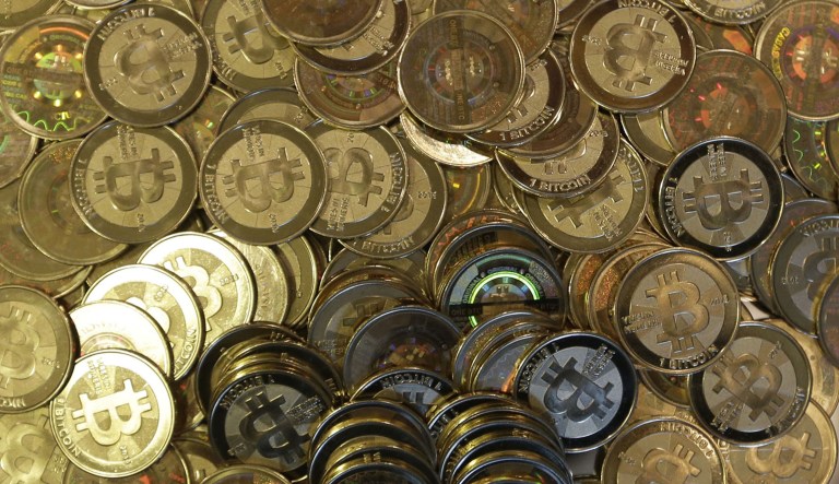 Bitcoin fluctuates in value, and people who gain income are supposed to pay taxes. Fewer than 900 people, however, reported gains between 2013 and 2015, Bloomberg reported. (AP Photo/Rick Bowmer)