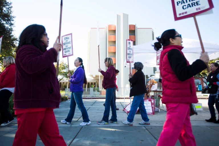   Registered nurses at Regional Medical Center of San Jose chant while protesting cuts in nursing staff, during a one-day strike Monday, Dec. 24, 2012, in San Jose, Calif. The strike is a part of protests held at nine Bay Area hospitals. (AP Photo/San Jose Mercury News, Dai Sugano) MAGS OUT NO SALES  