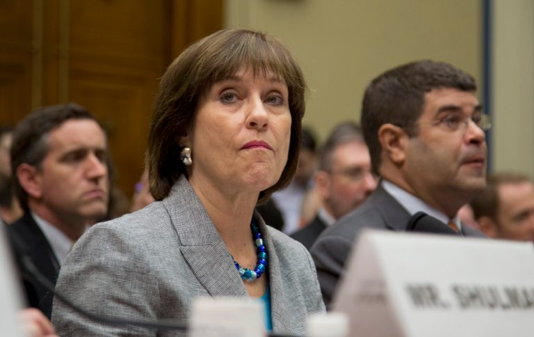 IRS official Lois Lerner pauses during a House Oversight and Government Reform Committee hearing on Capitol Hill in Washington, Wednesday, May 22, 2013, to investigate the extra scrutiny IRS gave to Tea Party and other conservative groups that applied for tax-exempt status.  Lerner told the committee she did nothing wrong and then invoked her constitutional right to not answer lawmakers' questions.   (AP Photo/Carolyn Kaster)
