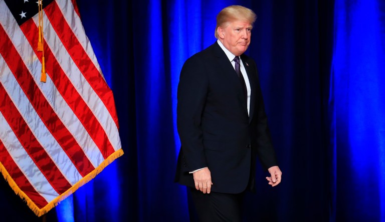 President Trump leaves the stage after laying out a national security strategy that envisions nations in perpetual competition, reverses Obama-era warnings on climate change, and de-emphasizes multinational agreements, in Washington, Monday, Dec. 18, 2017. (AP Photo/Manuel Balce Ceneta)