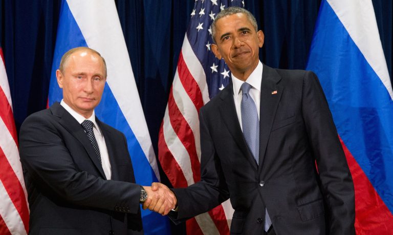 United States President Obama, right, and Russia's President President Vladimir Putin pose for the media before a bilateral meeting Monday, at U.N.Â headquarters. (AP Photo/Andrew Harnik)