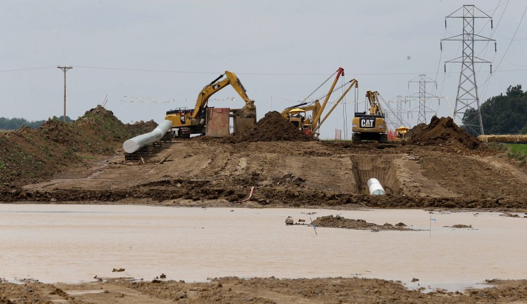 Energy Transfer Partners is known for its role in building the highly-politicized Dakota Access pipeline in North Dakota, which President Trump ordered the Army Corps of Engineers to expedite approval of early in his presidency. (AP Photo/Tony Dejak)