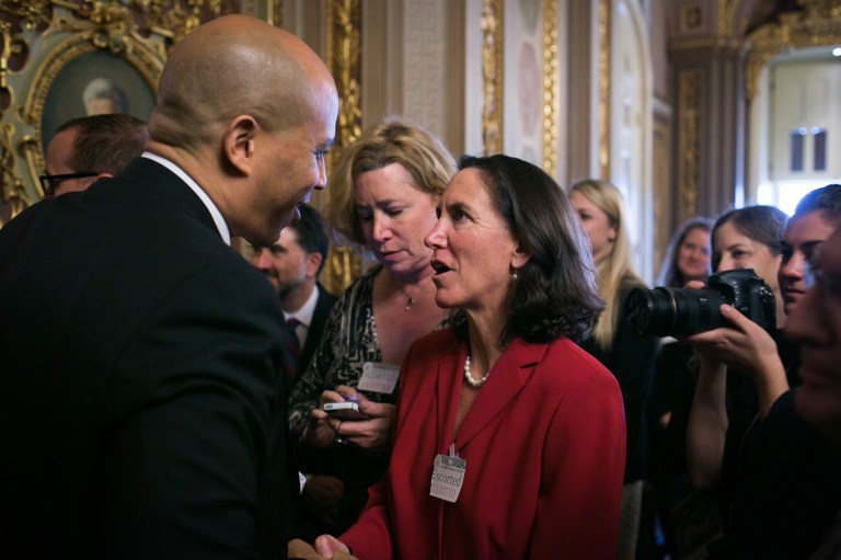 Sen. Cory Booker, D-N.J., meets with a supporter of equal rights for gay, lesbian, bisexual and transgender Americans after the Senate approved a bill outlawing workplace discrimination against LGBT people. (Photo: Graeme Jennings/Washington Examiner)