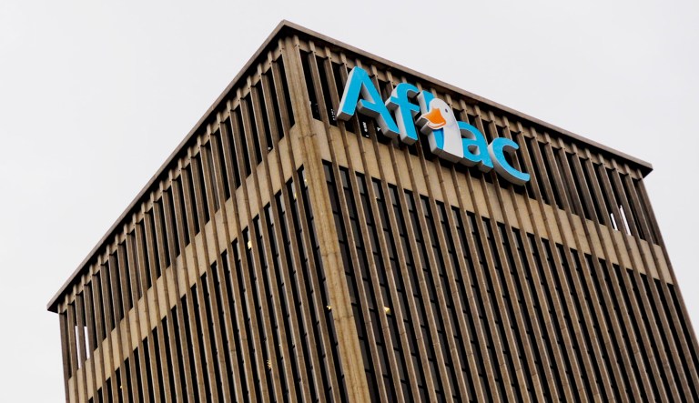 The insurance company said beginning next year, it will increase its 401(k) match from 50 percent to 100 percent on the first 4 percent of employee contributions and will also contribute $500 to each employee's 401(k) plan. (Chris Rank/ Bloomberg News)