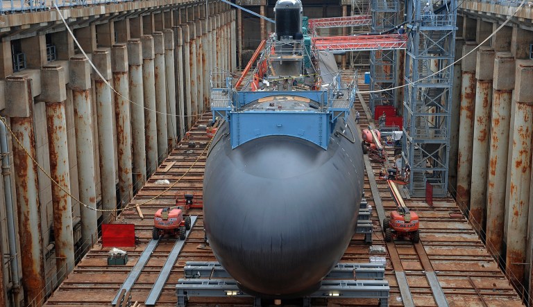 The protections are being considered after Trump called a 90-day halt to federal hiring as one of his first acts in office, causing a scramble by the military to issue individual hiring exemptions to allow needed work on ships and hardware to continue. (AP Photo/Jessica Hill)