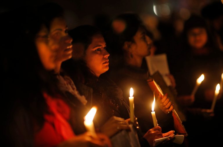   Indians hold a candle light vigil to salute the undying spirit of a rape victim and to mourn her death in New Delhi, India , Sunday, Dec. 30, 2012. The young woman who died after being gang-raped and beaten on a bus in India's capital was cremated Sunday amid an outpouring of anger and grief by millions across the country demanding greater protection for women from sexual violence. (AP Photo/ Saurabh Das)  