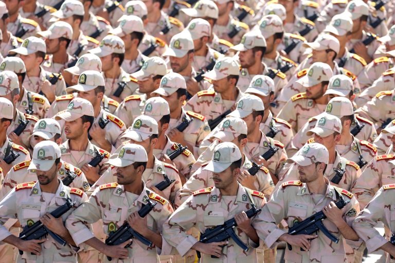 Members of the Iran's armed forces march during an annual military parade marking 34th anniversary of outset of the 1980-88 Iran-Iraq war, in front of the mausoleum of the late revolutionary founder Ayatollah Khomeini just outside Tehran, Iran, Monday, Sept. 22, 2014. (AP Photo/Ebrahim Noroozi)
