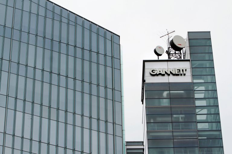 This file photograph taken July 14, 2010, shows Gannett headquarters in McLean, Va. Gannett Co. said Tuesday, Feb. 4, 2014, that its fourth-quarter net income dropped 12 percent, partially a result of the absence of the record-high political advertising that boosted its results a year earlier. 