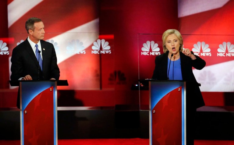 Martin O'Malley, who'd begged for 10 extra seconds of speaking time just minutes before, immediately responded with a stinging critique of Hillary Clinton's Wall Street ties and reform proposals. (AP Phoot)