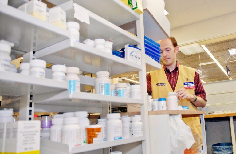 In this 2006 photo, Wal-Mart pharmacy technician Mark Pool fills a generic anti-inflammatory prescription at a Little Rock, Ark., Wal-Mart Super Center store. While the Constitution allows for patents, patents are temporary monopolies, meaning that drug companies want to extend their effective life as much as possible - much to the detriment of generics. (AP Photo/Mike Wintroath)