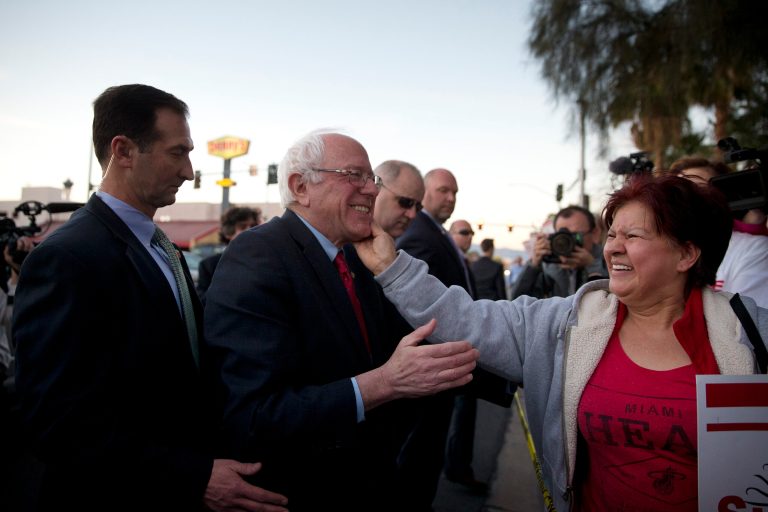 Democratic presidential candidate Sen. Bernie Sanders, I-Vt., center, is greeted by a culinary worker protesting outside Sunrise Hospital Thursday, Feb. 18, 2016, in Las Vegas. (AP Photo/Jae C. Hong)