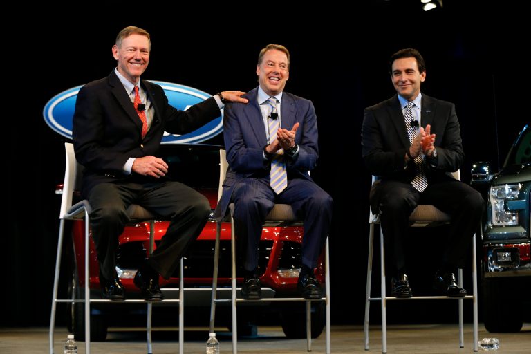 Ford Motor Company President and CEO Alan Mulally, from left, Executive Chairman Bill Ford Jr., and Chief Operating Officer Mark Fields appear during a news conference in Dearborn, Mich., Thursday, May 1, 2014. Ford announced CEO Alan Mulally will retire July 1 and be replaced by Fields. (AP Photo/Paul Sancya)