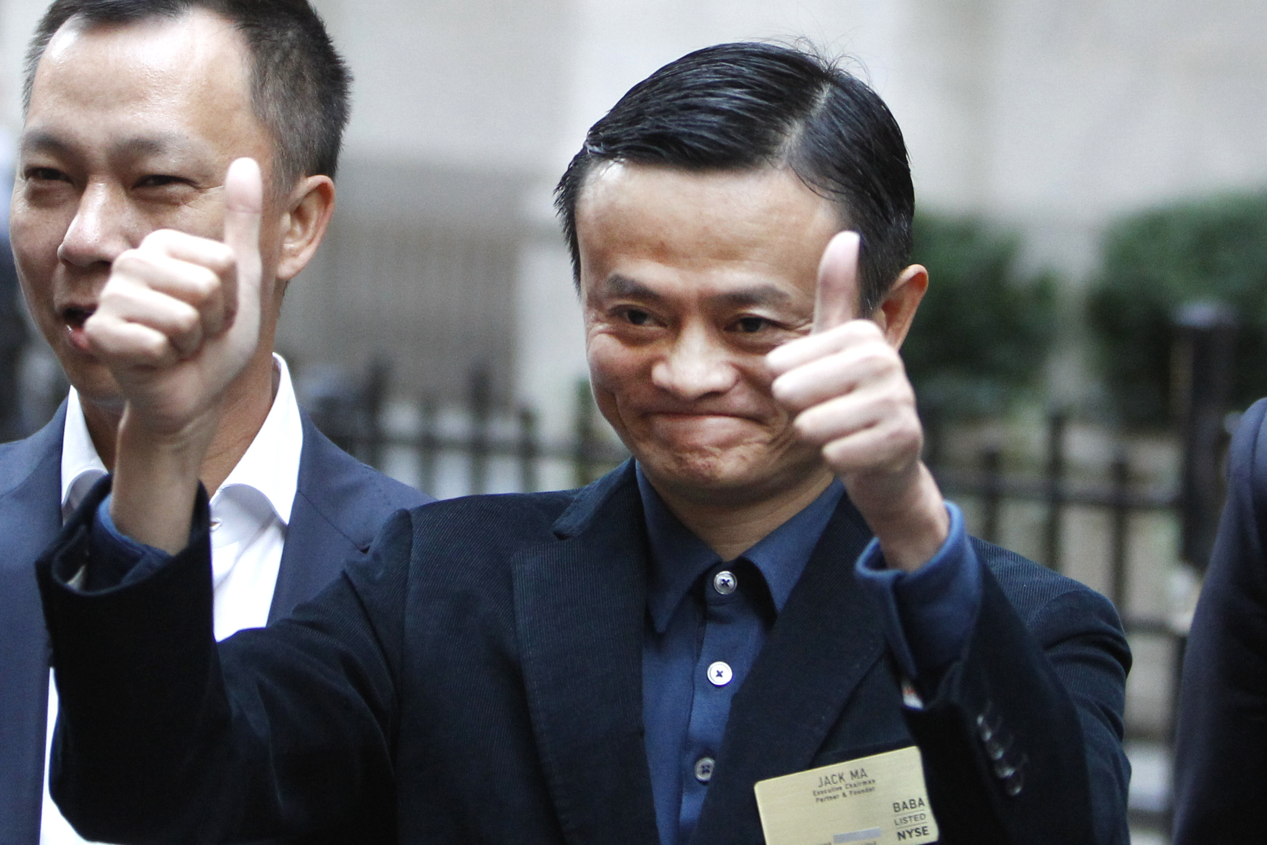 Alibaba stock soars in jubilant trading debut