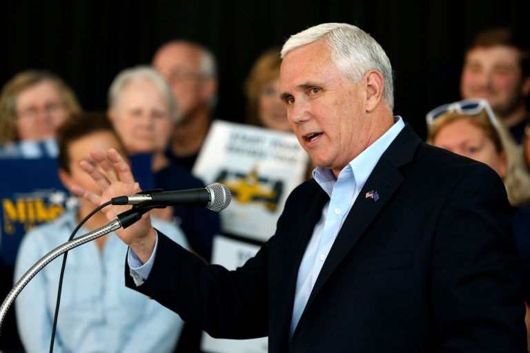 Pence, a former congressman, went on the offensive to "prosecute" Clinton from the stump. (AP Photo/Michael Conroy, File)