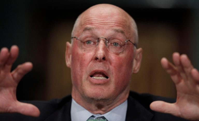 FILE - In this May 6, 2010 file photo, former Treasury Secretary Henry Paulson testifies on Capitol Hill in Washington. The 2008 government bailout of American International Group Inc. was specifically designed to punish the insurance giant, former Paulson said in U.S. court Monday, Oct. 6, 2014. (AP Photo/Pablo Martinez Monsivais, File)