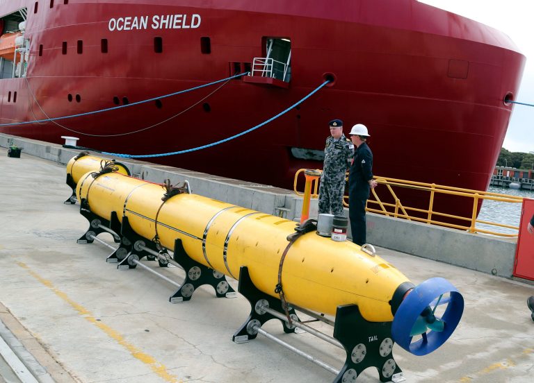 CORRECTS IDENTIFICATION OF EQUIPMENT TO AN AUTONOMOUS UNDERWATER VEHICLE INSTEAD OF A TOWED PINGER LOCATOR -  An autonomous underwater vehicle (AUV) sits on the wharf at naval base HMAS Stirling in Perth, Australia, ready to be fitted to the Australian warship Ocean Shield to aid in the search for missing Malaysia Airlines Flight MH370, Sunday, March 30, 2014. The Australian Maritime Safety Authority, which oversees the search, said the ship will be equipped with a black box detector â the U.S. Navy's Towed Pinger Locator â and the AUV, as well as other acoustic detection equipment. (AP Photo/Rob Griffith)