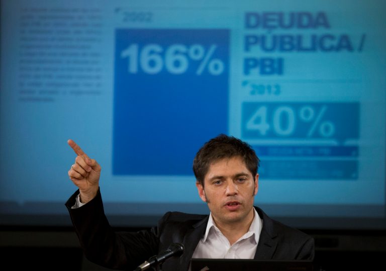FILE - In this June 17, 2014 file photo, Argentina's Economy MInister Axel Kicillof talks to the media during a news conference to explain the recent U.S. Supreme Court's ruling on Argentina's bond default and discuss how the government plans to proceed, in Buenos Aires, Argentina. For over a decade, Argentina avoided paying $1.5 billion it owed to U.S. hedge funds for defaulted bonds. But after the U.S. Supreme Court refused to intervene in the case this week, the country must pay up by the end of this month. (AP Photo/Eduardo Di Baia, File)