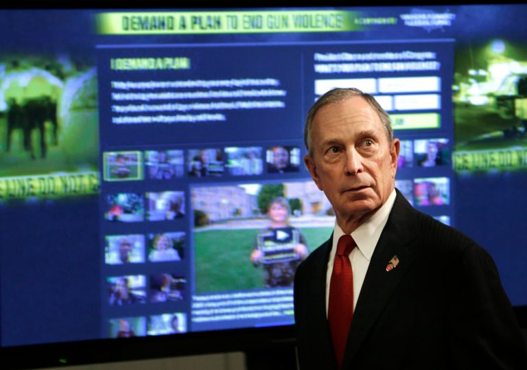 In this Dec. 17, 2012 file photo, then New York Mayor Michael Bloomberg speaks a news conference in New York where he and dozens of shooting survivors and victims' relatives called on Congress and President Obama to tighten gun laws and enforcement. (AP Photo/Seth Wenig)