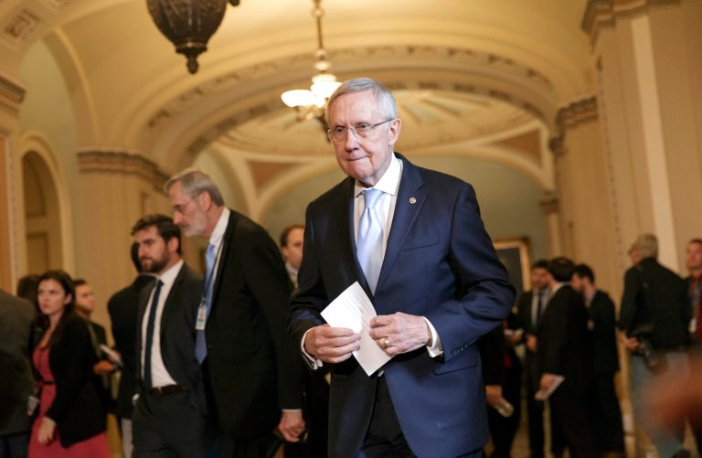 Senate Majority Leader Harry Reid, D-Nev., arrives to speak with reporters following a Democratic policy lunch at the Capitol in Washington, Tuesday, Sept. 16, 2014. (AP Photo/J. Scott Applewhite)