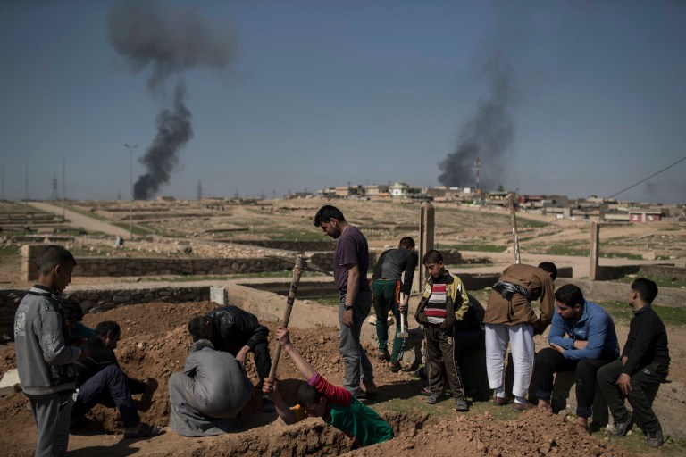 More than 100 Iraqi civilians were killed this month when a building collapsed in a dense Mosul combat zone. (AP Photo/Felipe Dana)