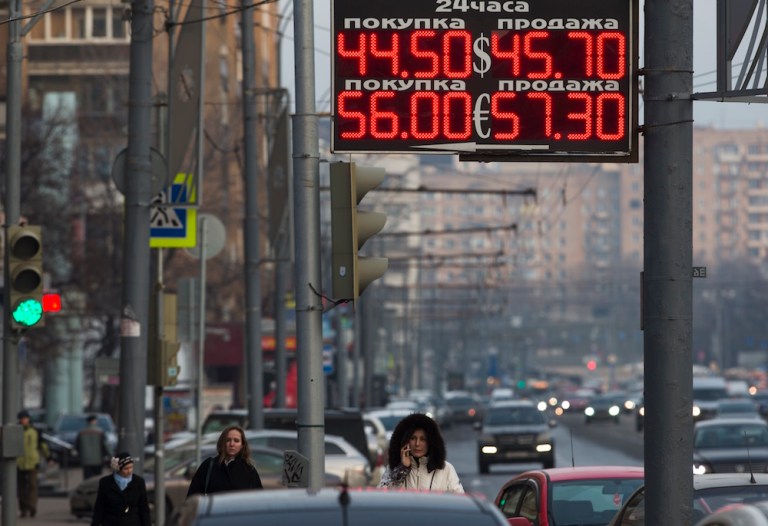 The new regulations require Ukrainian banks to meet eight criteria to be eligible to handle these payments. (AP Photo/Pavel Golovkin)