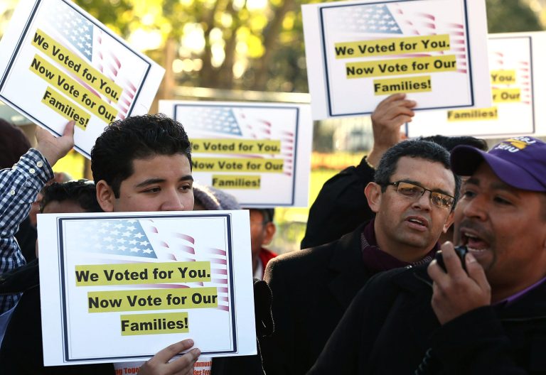 Latinos and immigrants participate in a rally on immigration reform in front of the White House on November 8, 2012. (Getty images/Mark Wilson)