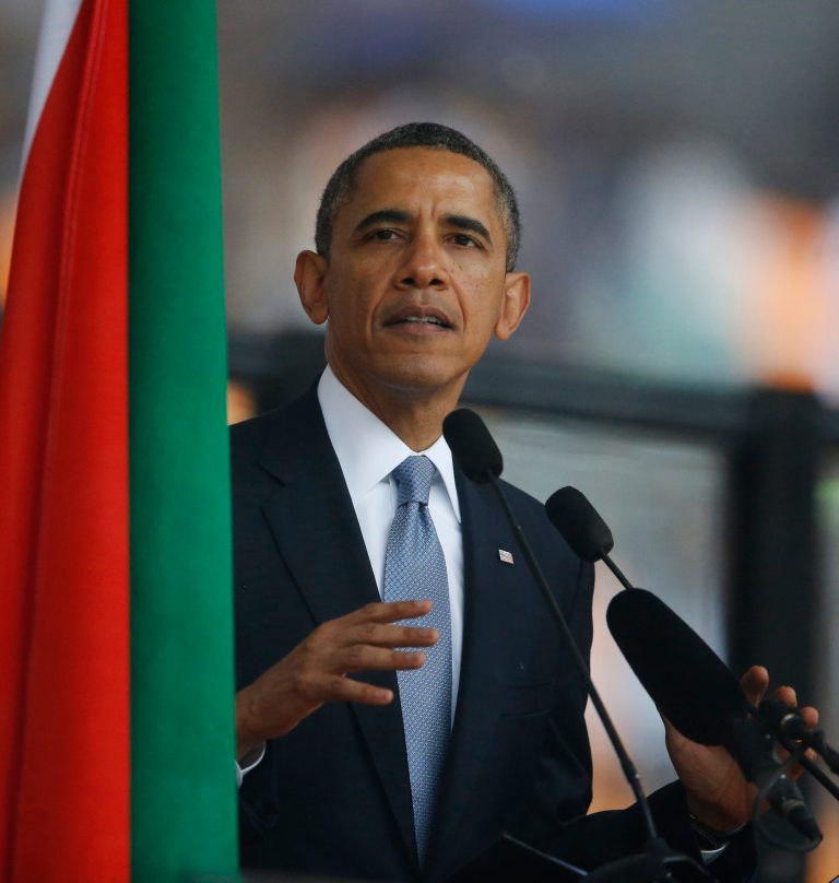 President Barrack Obama speaks at the memorial service for former South African president Nelson Mandela at the FNB Stadium in Soweto near Johannesburg, Tuesday, Dec. 10, 2013. (AP Photo/Matt Dunham)