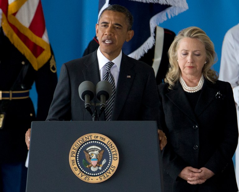 President Obama, accompanied by Secretary of State Hillary Clinton, speaks during a Transfer of Remains Ceremony, Friday, Sept. 14, 2012, at Andrews Air Force Base, Md. (AP/Carolyn Kaster)