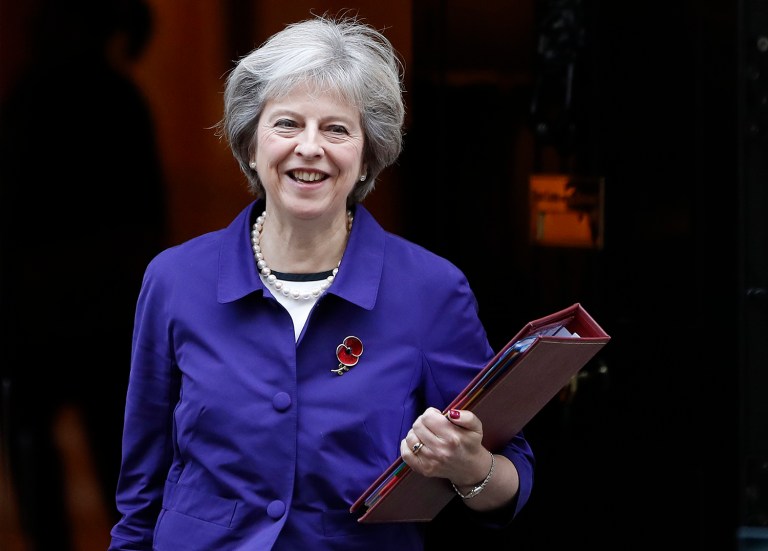 Britain's Prime Minister Theresa May congratulated President-elect Donald Trump early Wednesday. (AP Photo/Kirsty Wigglesworth)