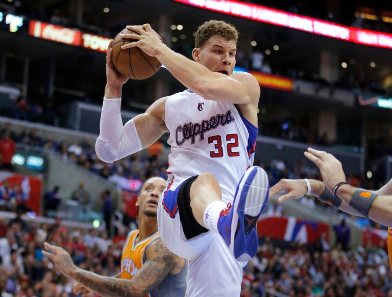   Los Angeles Clippers' Blake Griffin gets a rebound in the first half of an NBA basketball game against the Phoenix Suns in Los Angeles, Saturday, Dec. 8, 2012. (AP Photo/Jae C. Hong)  
