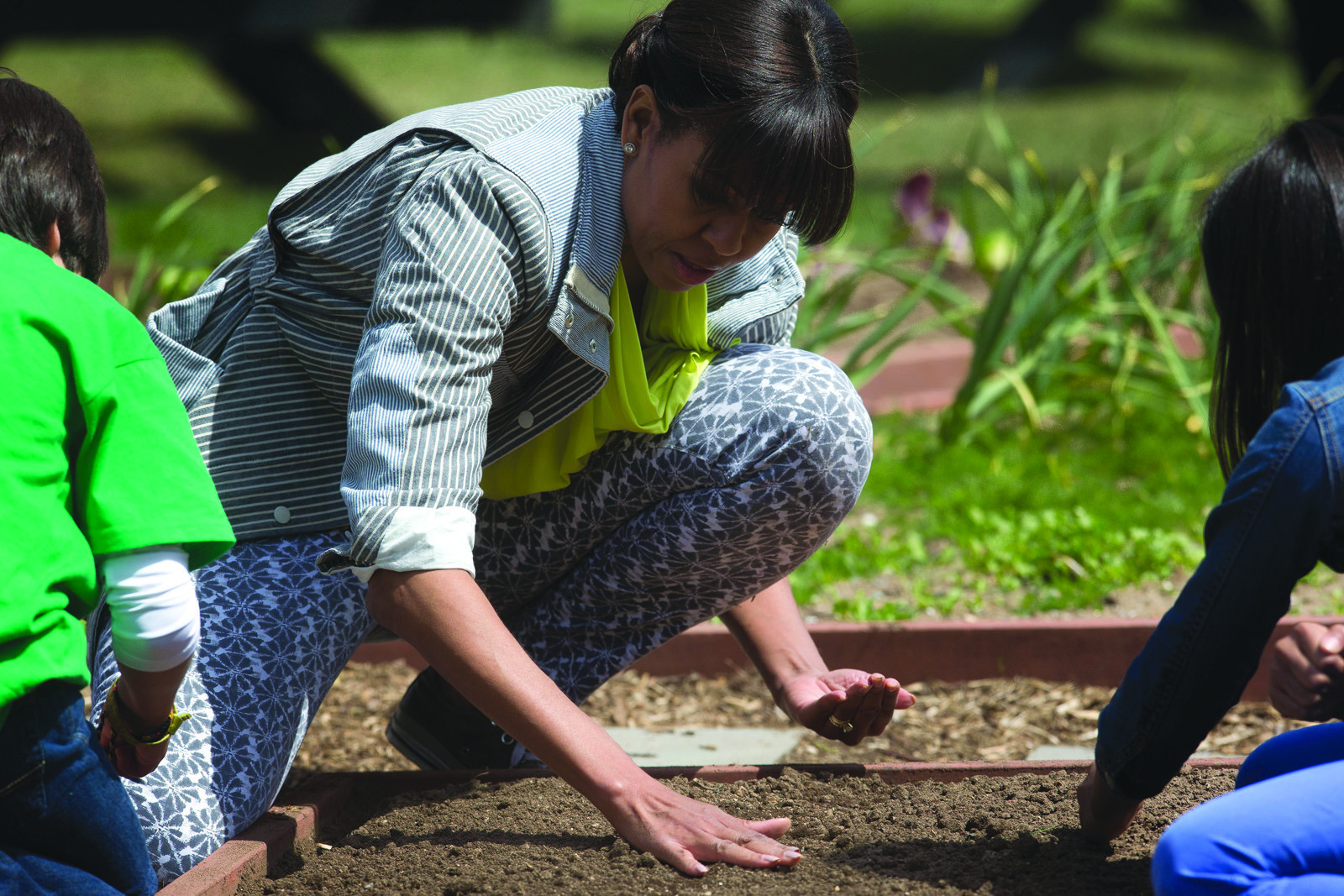 Michelle Obama plants her garden