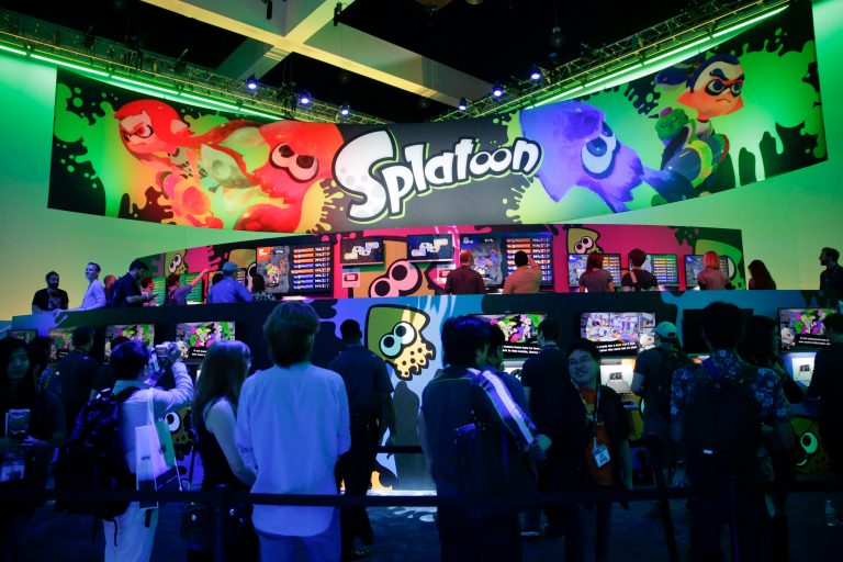 People wait in line to play the 