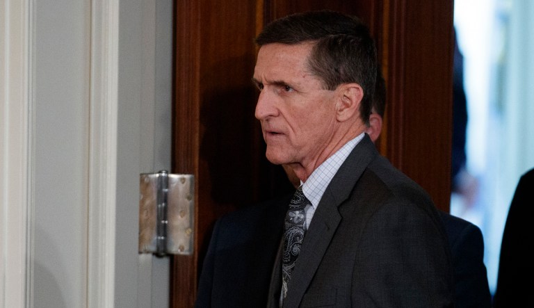 Former national security adviser Mike Flynn told President Trump's transition team that he was under federal investigation weeks before the inauguration, according to a report. (AP Photo/Evan Vucci, File)