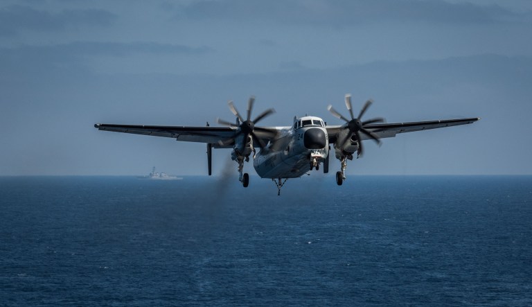 A Navy C-2A Greyhound carrying 11 passengers and crew crashed into the Philippine Sea on Friday. Eight people have been recovered. (Navy photo)