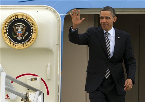 With cuts looming, what has Obama done to reduce cost of presidential travel?