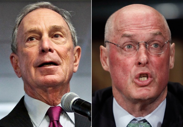 This combo made from file photos shows former New York City Mayor Michael Bloomberg, left, and former Treasury Secretary Henry Paulson. Climate change will exact enormous costs on U.S. regional economies in the form of lost property, reduced industrial output and higher health expenses, according to a report backed by Bloomberg, Paulson and Thomas F. Steyer, a former hedge fund manager. (AP Photo/Bebeto Matthews, Pablo Martinez Monsivais, File)