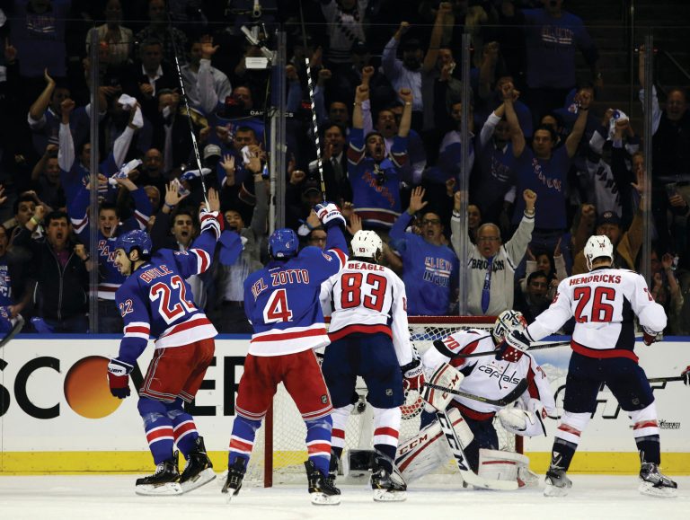 Kathy Willens/AP
Center Brian Boyle scored a first-period goal, the first of four by the Rangers in New York's Game 3 win over Washington.
