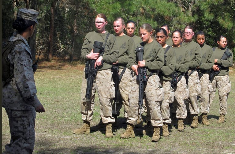 It's plain: Women in combat will mean lower standards. (AP Photo/Bruce Smith, File)