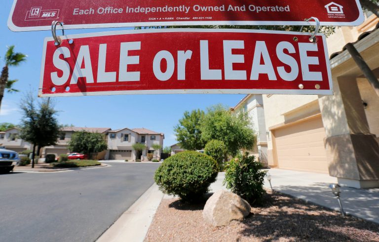   FILE - In this Tuesday, July 30, 2013, file photo, A home is seen for sale Tuesday, July 30, 2013 in Gilbert, Ariz. Freddie Mac reports quarterly earnings on Tuesday, Aug. 7, 2013. (AP Photo/Matt York)  