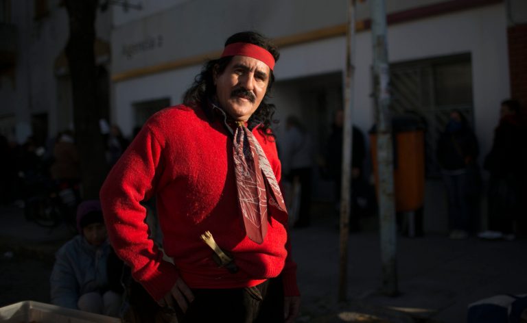 Angelito Ribero, poses for a photo dressed as 